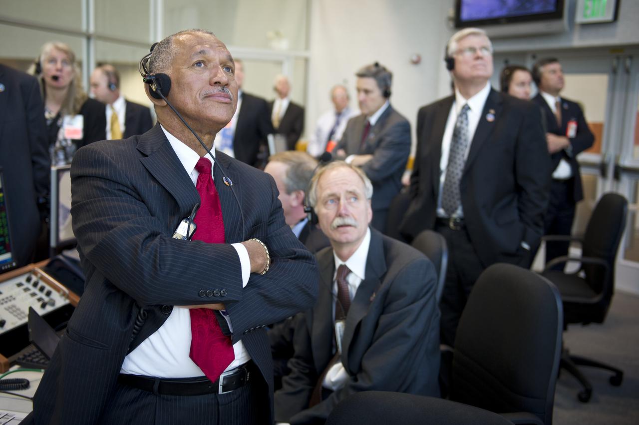 NASA Administrator Charles Bolden and other NASA management watch the launch of space shuttle Discovery (STS-133) from the firing room at Kennedy Space Center, Thursday, Feb. 24, 2011, in Cape Canaveral, Fla. Discovery, on its 39th and final flight, is carrying the Italian-built Permanent Multipurpose Module (PMM), Express Logistics Carrier 4 (ELC4) and Robonaut 2, the first humanoid robot in space to the International Space Station. Photo Credit: (NASA/Bill Ingalls)