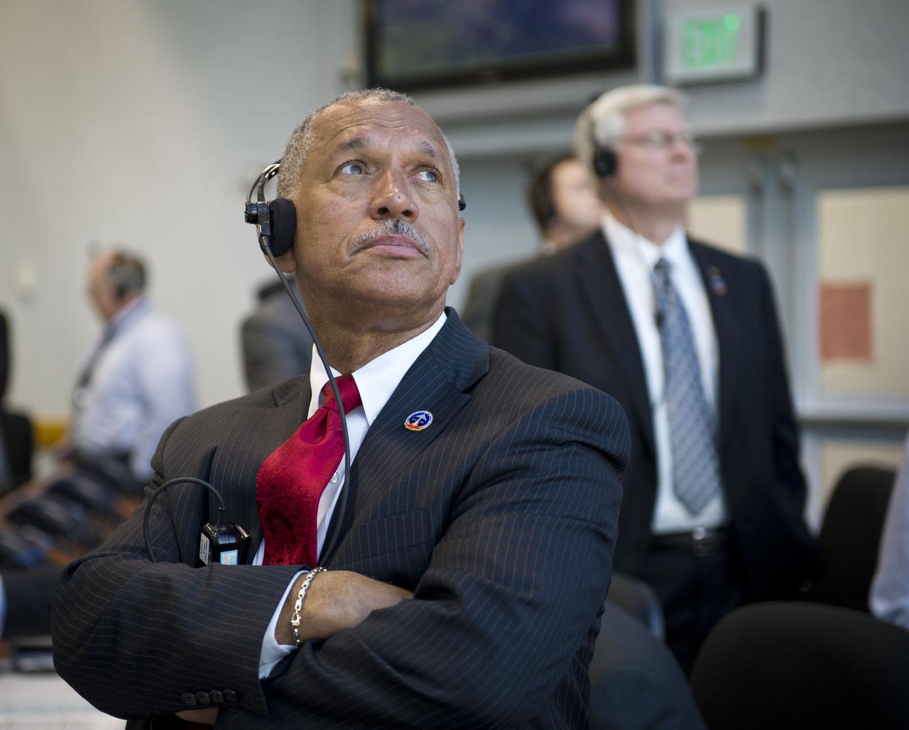 NASA Administrator Charles Bolden and other NASA management watch the launch of space shuttle Discovery (STS-133) from the firing room at Kennedy Space Center, Thursday, Feb. 24, 2011, in Cape Canaveral, Fla. Discovery, on its 39th and final flight, is carrying the Italian-built Permanent Multipurpose Module (PMM), Express Logistics Carrier 4 (ELC4) and Robonaut 2, the first humanoid robot in space to the International Space Station. Photo Credit: (NASA/Bill Ingalls)