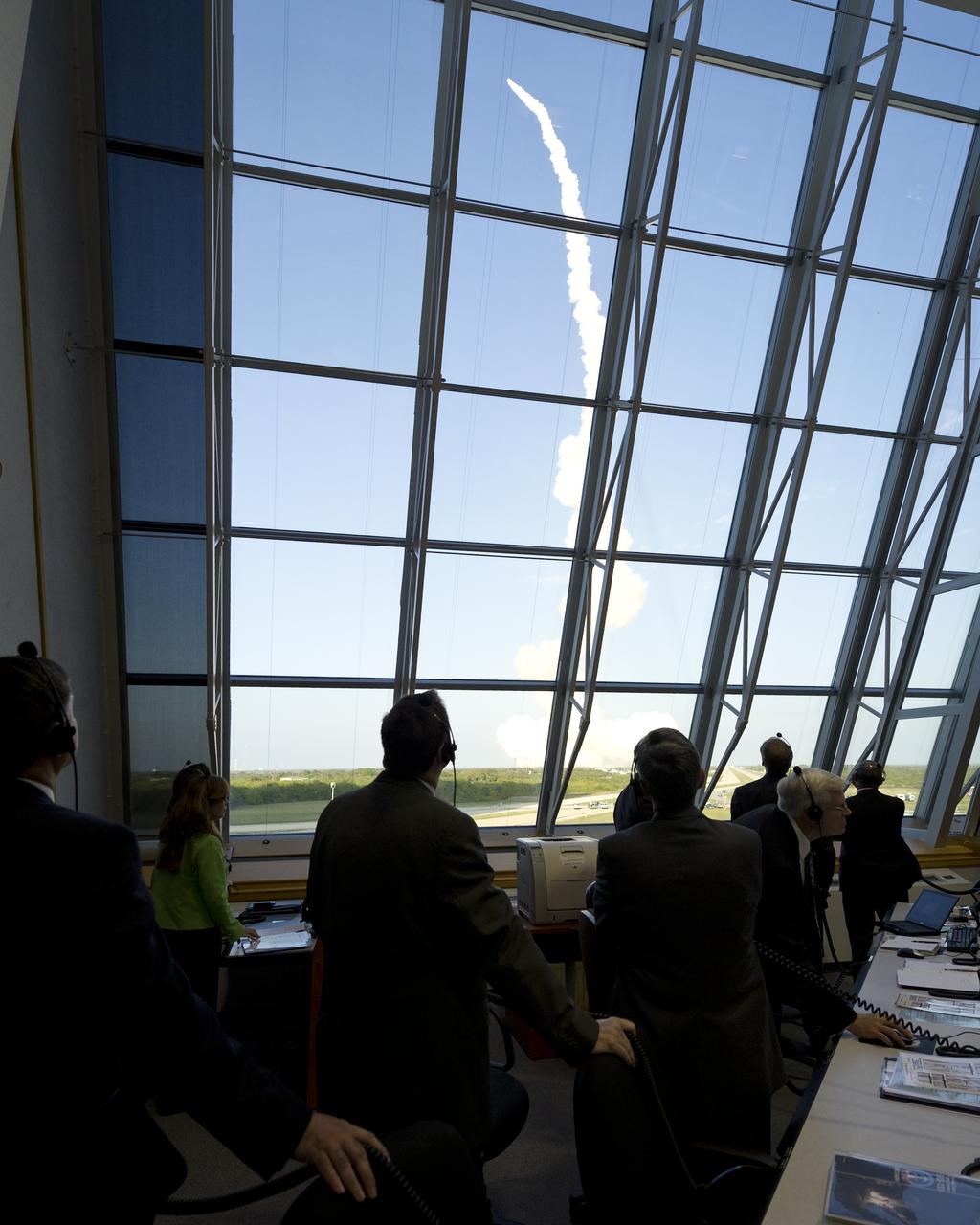 NASA management watch the launch of space shuttle Discovery (STS-133) from the firing room at Kennedy Space Center, Thursday, Feb. 24, 2011, in Cape Canaveral, Fla. Discovery, on its 39th and final flight, is carrying the Italian-built Permanent Multipurpose Module (PMM), Express Logistics Carrier 4 (ELC4) and Robonaut 2, the first humanoid robot in space to the International Space Station. Photo Credit: (NASA/Bill Ingalls)