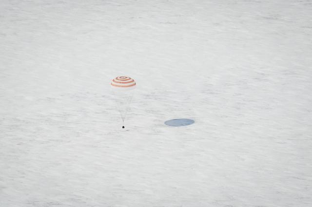 The Soyuz TMA-01M spacecraft is seen as it lands with Expedition 26 Commander Scott Kelly and Flight Engineers Oleg Skripochka and Alexander Kaleri near the town of Arkalyk, Kazakhstan on Wednesday, March 16, 2011. NASA Astronaut Kelly, Russian Cosmonauts Skripochka and Kaleri are returning from almost six months onboard the International Space Station where they served as members of the Expedition 25 and 26 crews. Photo Credit: (NASA/Bill Ingalls)