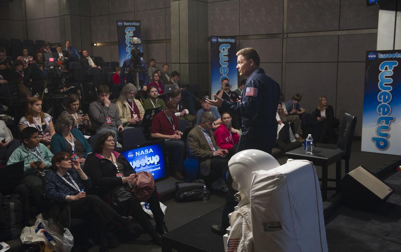 Astronaut Doug Wheelock discusses his experiences while living on the International Space Station during a tweetup at NASA Headquarters in Washington, Wednesday, March 16, 2011. Wheelock, who has accumulated a total of 178 days in space, assumed command of the International Space Station and the Expedition 25 crew. During Expedition 25, there were more than 120 microgravity experiments in human research; biology and biotechnology; physical and materials sciences; technology development; and Earth and space sciences. Wheelock also responded to an emergency shutdown of half of the station's external cooling system and supported three unplanned spacewalks to replace the faulty pump module that caused the shutdown. His efforts restored the station's critical cooling system to full function. The mission duration was 163 days. Photo Credit: (NASA/Paul E. Alers)