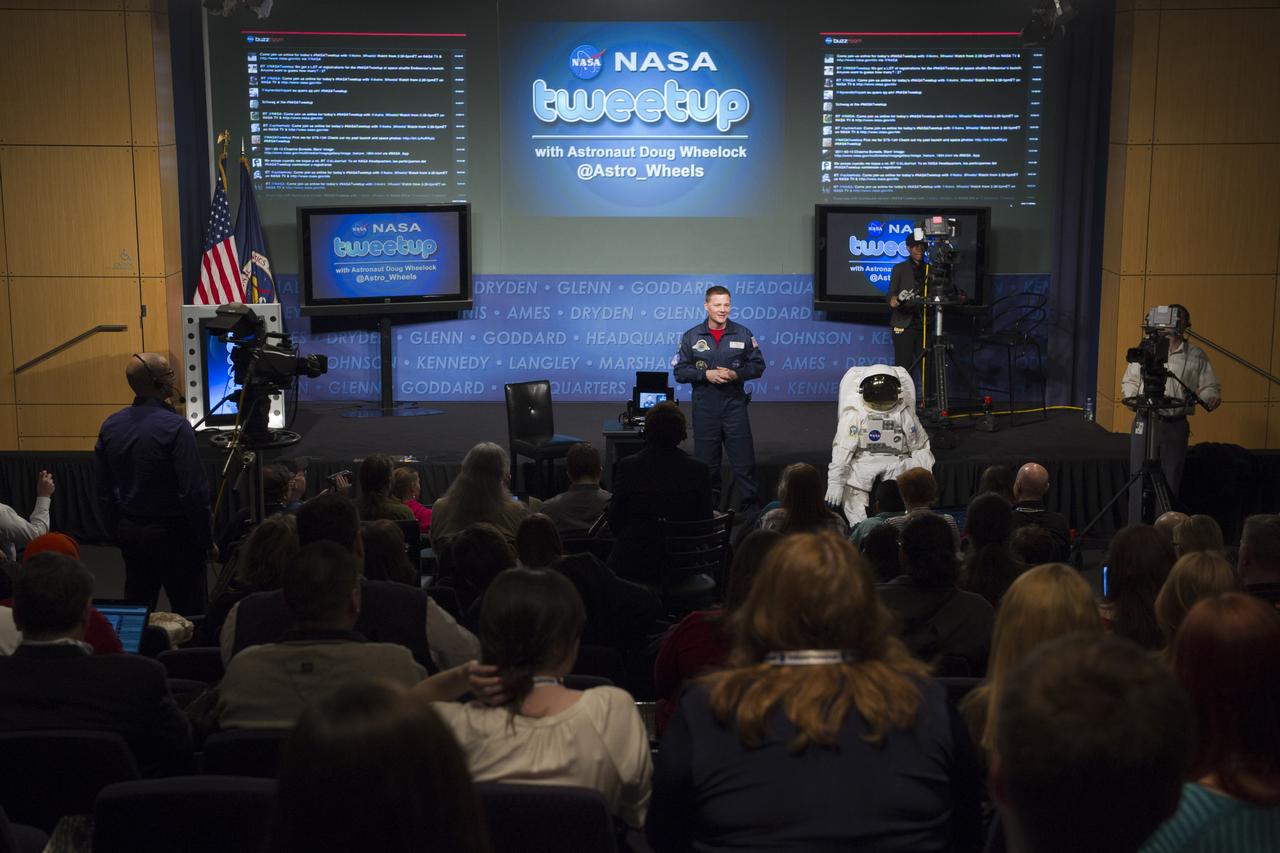 Astronaut Doug Wheelock discusses his experiences while living on the International Space Station during a tweetup at NASA Headquarters in Washington, Wednesday, March 16, 2011. Wheelock, who has accumulated a total of 178 days in space, assumed command of the International Space Station and the Expedition 25 crew. During Expedition 25, there were more than 120 microgravity experiments in human research; biology and biotechnology; physical and materials sciences; technology development; and Earth and space sciences. Wheelock also responded to an emergency shutdown of half of the station's external cooling system and supported three unplanned spacewalks to replace the faulty pump module that caused the shutdown. His efforts restored the station's critical cooling system to full function. The mission duration was 163 days. Photo Credit: (NASA/Paul E. Alers)