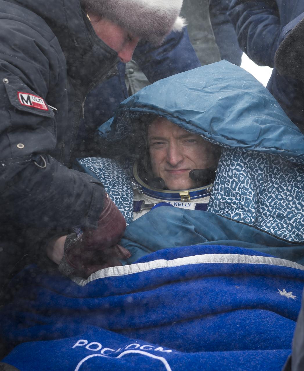 Expedition 26 Commander Scott Kelly rest in a chair shortly after he and fellow crew members Alexander Kaleri and Oleg Skripochka landed in their Soyuz TMA-01M capsule near the town of Arkalyk, Kazakhstan on Wednesday, March 16, 2011. NASA Astronaut Kelly, Russian Cosmonauts Skripochka and Kaleri are returning from almost six months onboard the International Space Station where they served as members of the Expedition 25 and 26 crews. Photo Credit: (NASA/Bill Ingalls)