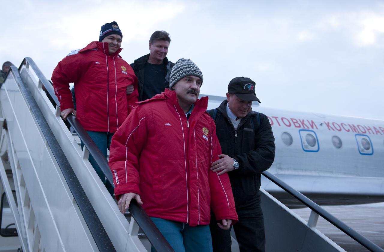Expedition 26 Flight Engineer Alexander Kaleri, bottom, and Expedition 26 Flight Engineer Oleg Skripochka are seen as they arrive at the Chkalovsky airport outside Star City, Russia several hours after they and Expedition 26 Commander Scott Kelly landed in their Soyuz TMA-01M capsule near the town of Arkalyk, Kazakhstan, Wednesday, March 16, 2011.  NASA Astronaut Kelly, Russian Cosmonauts Skripochka and Kaleri are returning from almost six months onboard the International Space Station where they served as members of the Expedition 25 and 26 crews. Photo Credit: (NASA/Bill Ingalls)