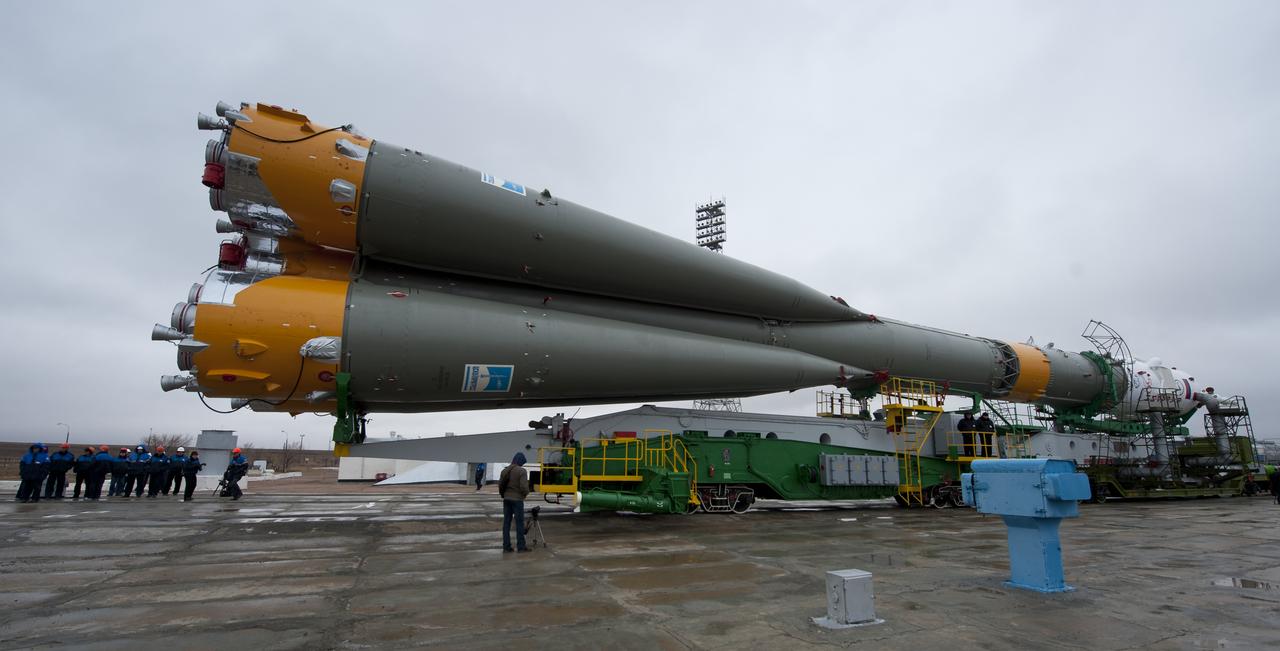 The Soyuz TMA-21 spacecraft is seen shortly after arriving at the launch pad Saturday, April 2, 2011 at the Baikonur Cosmodrome in Kazakhstan.  The Soyuz, which has been dubbed “Gagarin”, is launching one week shy of the 50th anniversary of the launch of Yuri Gagarin from the same launch pad in Baikonur on April 12, 1961 to become the first human to fly in space. The first stage of the Soyuz booster is emblazoned with the name “Gagarin” and the likeness of the first person to fly in space.  Photo Credit (NASA/Carla Cioffi)