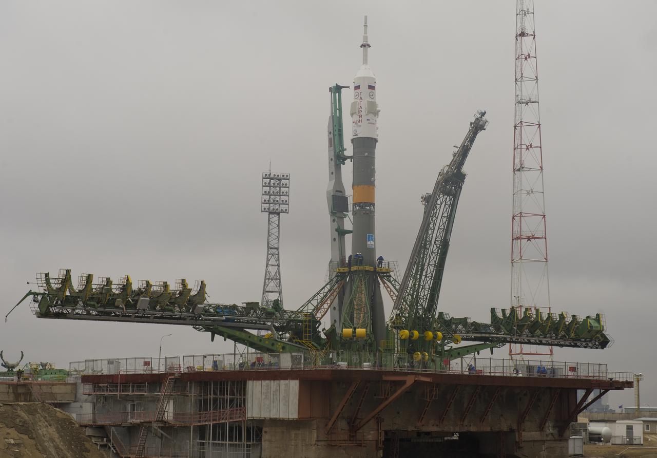 The Soyuz TMA-21 spacecraft is seen on the launch pad at the Baikonur Cosmodrome in Kazakhstan, Saturday, April 2, 2011.  The launch of the Soyuz spacecraft with Expedition 27 Soyuz Commander Alexander Samokutyaev, NASA Flight Engineer Ron Garan and Russian Flight Engineer Andrey Borisenko is scheduled for Tuesday, April 5, 2011. The Soyuz, which has been dubbed “Gagarin”, is launching one week shy of the 50th anniversary of the launch of Yuri Gagarin from the same launch pad in Baikonur on April 12, 1961 to become the first human to fly in space. The first stage of the Soyuz booster is emblazoned with the name “Gagarin” and the likeness of the first person to fly in space.  Photo Credit (NASA/Carla Cioffi)