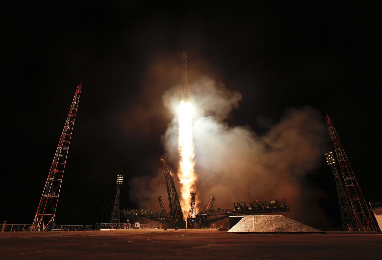 The Soyuz TMA-21 launches from the Baikonur Cosmodrome in Kazakhstan on Tuesday, April 5, 2011 carrying Expedition 27 Soyuz Commander Alexander Samokutyaev, NASA Flight Engineer Ron Garan and Russian Flight Engineer Andrey Borisenko to the International Space Station.  The Soyuz, which has been dubbed "Gagarin", is launching one week shy of the 50th anniversary of the launch of Yuri Gagarin from the same launch pad in Baikonur on April 12, 1961 to become the first human to fly in space.  Photo Credit:  (NASA/Carla Cioffi)