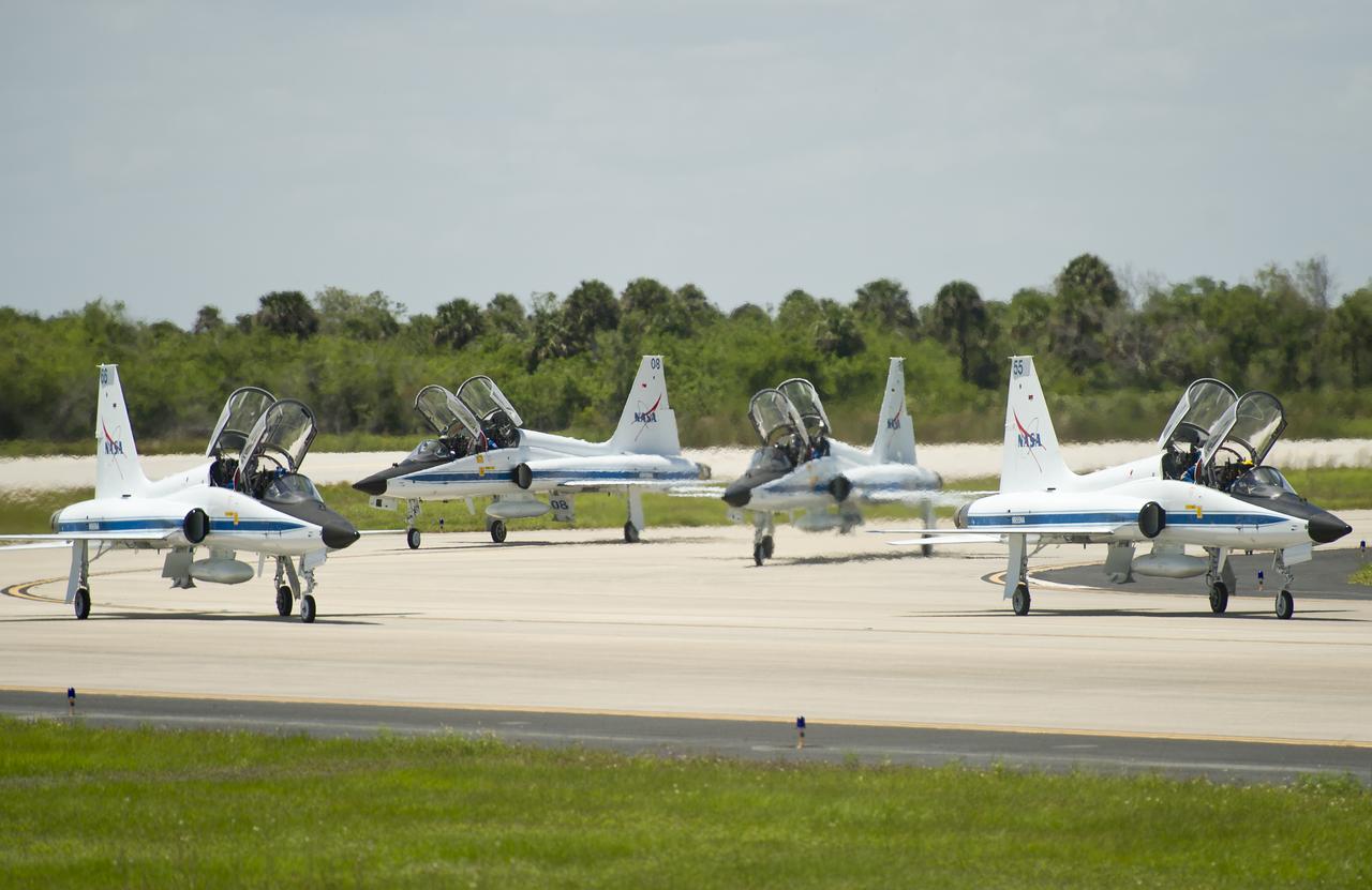 The STS-134 crew arrives in T-38 jets on Tuesday, April 26, 2011 at the NASA Kennedy Space Center Shuttle Landing Facility (SLF) in Cape Canaveral, Fla. During the 14-day mission, the space shuttle Endeavour and its crew will deliver the Alpha Magnetic Spectrometer (AMS) and spare parts including two S-band communications antennas, a high-pressure gas tank and additional spare parts for Dextre. Launch is targeted for Friday, April 29 at 3:47 p.m. EDT.  Photo credit: (NASA/Bill Ingalls)
