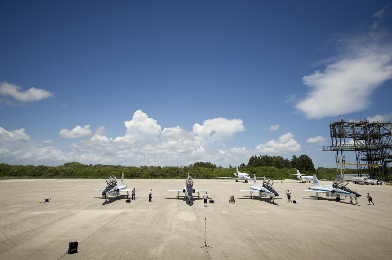 The STS-134 crew arrives in T-38 jets on Tuesday, April 26, 2011 at the NASA Kennedy Space Center Shuttle Landing Facility (SLF) in Cape Canaveral, Fla. During the 14-day mission, the space shuttle Endeavour and its crew will deliver the Alpha Magnetic Spectrometer (AMS) and spare parts including two S-band communications antennas, a high-pressure gas tank and additional spare parts for Dextre. Launch is targeted for Friday, April 29 at 3:47 p.m. EDT.  Photo credit: (NASA/Bill Ingalls)