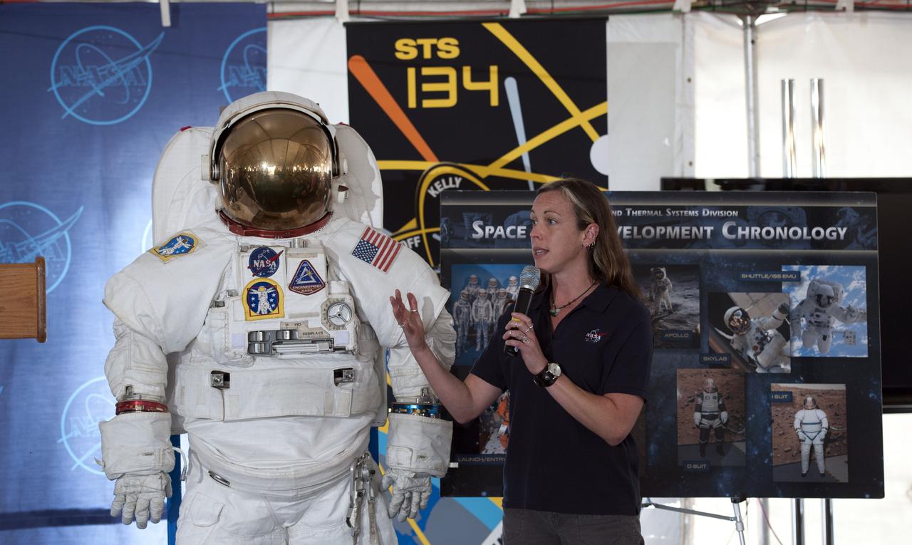 Heather Paul, a project engineer for Johnson Space Center, talks about space suit technology during the STS-134 Tweetup, Thursday, April 28, 2011, at Kennedy Space Center in Cape Canaveral, Fla. About 150 NASA Twitter followers attended the event. Photo Credit: (NASA/Paul E. Alers)
