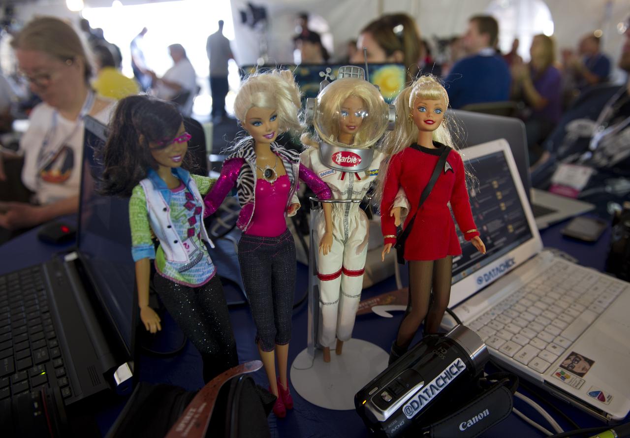 Barbie Dolls stand by during the STS-134 Tweetup, Thursday, April 28, 2011, at Kennedy Space Center in Cape Canaveral, Fla. About 150 NASA Twitter followers attended the event. Photo Credit: (NASA/Paul E. Alers)