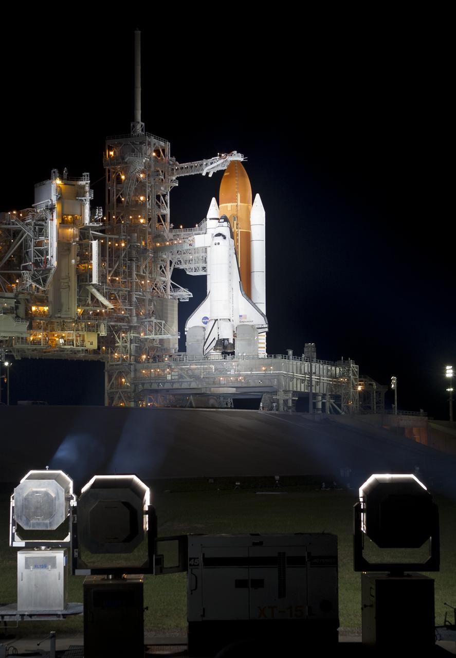 The space shuttle Endeavour is seen on launch pad 39a after the rollback of the Rotating Service Structure (RSS), Thursday, April 28, 2011, at Kennedy Space Center in Cape Canaveral, Fla. During the 14-day mission, Endeavour and the STS-134 crew will deliver the Alpha Magnetic Spectrometer (AMS) and spare parts including two S-band communications antennas, a high-pressure gas tank and additional spare parts for Dextre. Launch is targeted for Friday, April 29 at 3:47 p.m. EDT.  Photo credit: (NASA/Bill Ingalls)