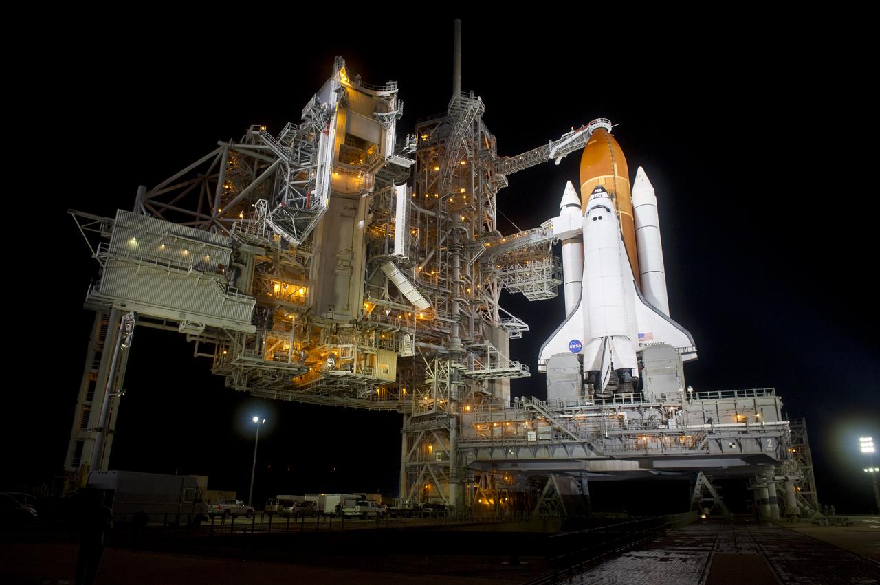 The space shuttle Endeavour is seen on launch pad 39a after the rollback of the Rotating Service Structure (RSS), Thursday, April 28, 2011, at Kennedy Space Center in Cape Canaveral, Fla. During the 14-day mission, Endeavour and the STS-134 crew will deliver the Alpha Magnetic Spectrometer (AMS) and spare parts including two S-band communications antennas, a high-pressure gas tank and additional spare parts for Dextre. Launch is targeted for Friday, April 29 at 3:47 p.m. EDT.  Photo credit: (NASA/Bill Ingalls)