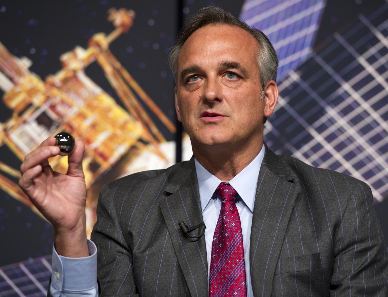 Rex Geveden, President of Teledyne Brown Engineering, makes a point during a press conference, Wednesday, May 4, 2011, to discuss NASA's Gravity Probe B (GP-B) mission which has confirmed two key predictions derived from Albert Einstein's general theory of relativity, which the spacecraft was designed to test at NASA Headquarters in Washington. The experiment, launched in 2004, used four ultra-precise gyroscopes to measure the hypothesized geodetic effect, the warping of space and time around a gravitational body, and frame-dragging, the amount a spinning object pulls space and time with it as it rotates. Photo Credit: (NASA/Paul E. Alers)
