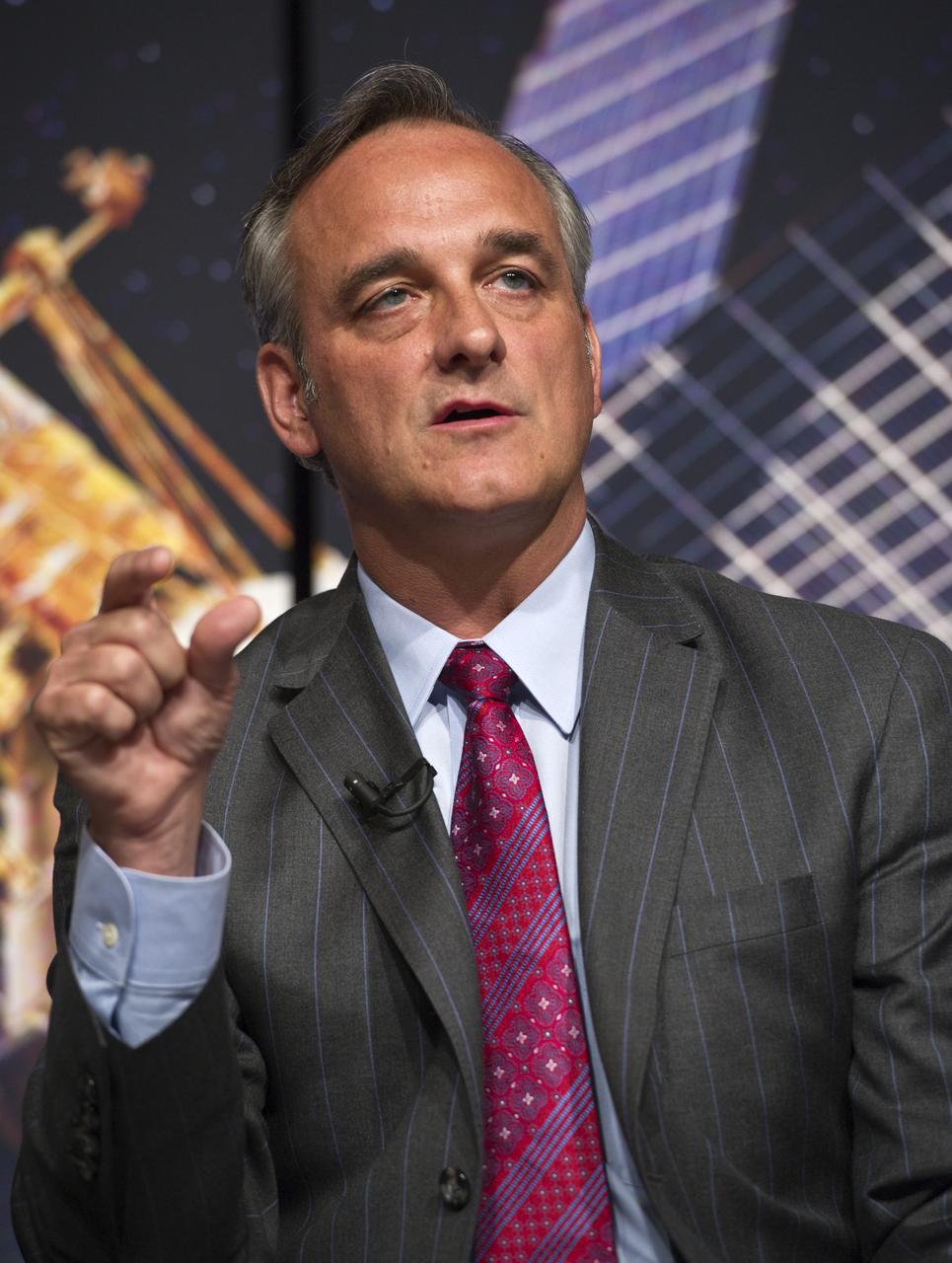 Rex Geveden, President of Teledyne Brown Engineering, makes a point during a press conference, Wednesday, May 4, 2011, to discuss NASA's Gravity Probe B (GP-B) mission which has confirmed two key predictions derived from Albert Einstein's general theory of relativity, which the spacecraft was designed to test at NASA Headquarters in Washington. The experiment, launched in 2004, used four ultra-precise gyroscopes to measure the hypothesized geodetic effect, the warping of space and time around a gravitational body, and frame-dragging, the amount a spinning object pulls space and time with it as it rotates. Photo Credit: (NASA/Paul E. Alers)