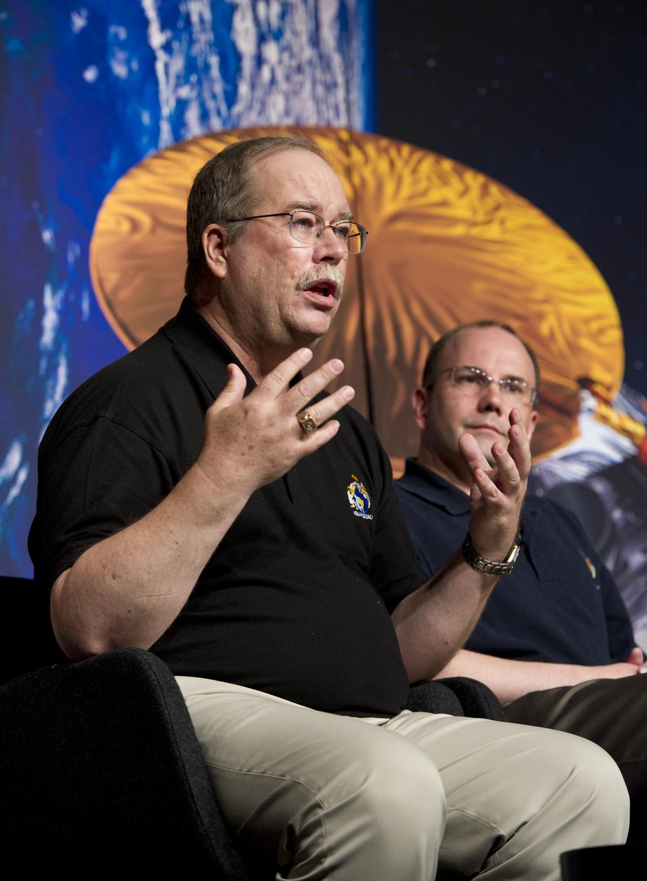 Eric Lindstrom, left, Aquarius Program Scientist, NASA Headquarters, talks about NASA's Aquarius/SAC-D mission to study the salinity of Earth's oceans from space on Tuesday, May 17, 2011 at NASA Headquarters in Washington.  The mission is a collaboration between NASA and Argentina's space agency Comision Nacional de Actividades Especiales (CONAE), with participation from Brazil, Canada, France and Italy.  The Aquarius/SAC-D observatory will launch June 9, 2011 from Vandenberg Air Force Base in California.  Photo Credit:  (NASA/Carla Cioffi)