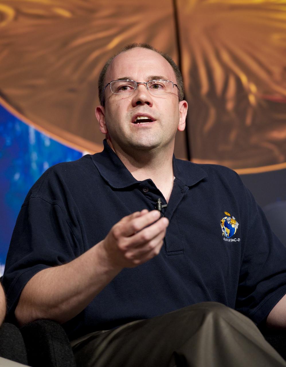 Eric Ianson, Aquarius Program Executive, NASA Headquarters, talks about NASA's Aquarius/SAC-D mission to study the salinity of Earth's oceans from space on Tuesday, May 17, 2011 at NASA Headquarters in Washington.  The mission is a collaboration between NASA and Argentina's space agency Comision Nacional de Actividades Especiales (CONAE), with participation from Brazil, Canada, France and Italy.  The Aquarius/SAC-D observatory will launch June 9, 2011 from Vandenberg Air Force Base in California.  Photo Credit:  (NASA/Carla Cioffi)