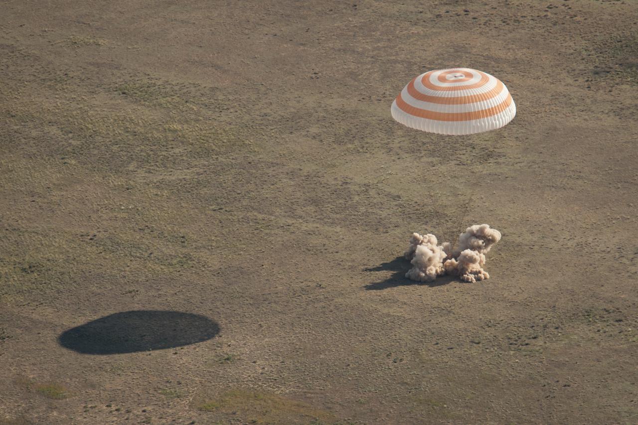 The Soyuz TMA-20 spacecraft is seen as it lands with Expedition 27 Commander Dmitry Kondratyev and Flight Engineers Paolo Nespoli and Cady Coleman in a remote area southeast of the town of Zhezkazgan, Kazakhstan, on Tuesday, May 24, 2011. NASA Astronaut Coleman, Russian Cosmonaut Kondratyev and Italian Astronaut Nespoli are returning from more than five months onboard the International Space Station where they served as members of the Expedition 26 and 27 crews. Photo Credit: (NASA/Bill Ingalls)
