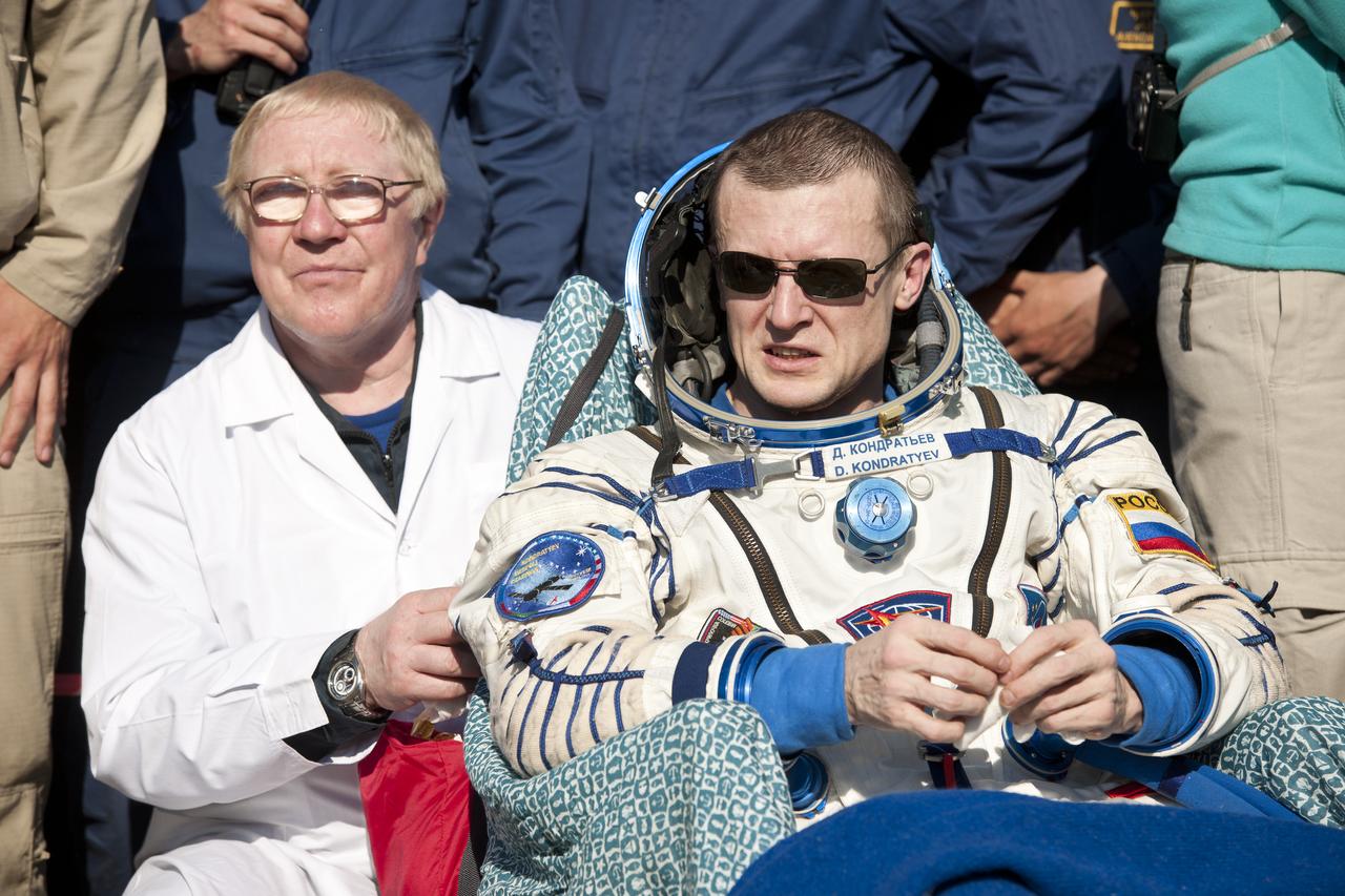 Expedition 27 Commander Dmitry Kondratyev rests in a chair shortly after he and Flight Engineers Cady Coleman and Paolo Nespoli landed in their Soyuz TMA-20 southeast of the town of Zhezkazgan, Kazakhstan, on Tuesday, May 24, 2011. NASA Astronaut Coleman, Russian Cosmonaut Kondratyev and Italian Astronaut Nespoli are returning from more than five months onboard the International Space Station where they served as members of the Expedition 26 and 27 crews. Photo Credit: (NASA/Bill Ingalls)