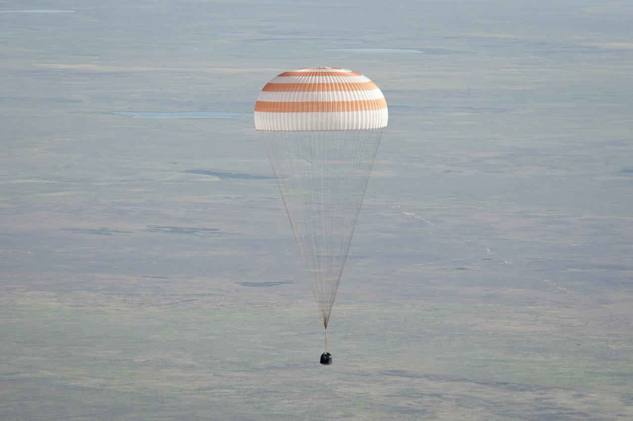 The Soyuz TMA-20 spacecraft is seen as it lands with Expedition 27 Commander Dmitry Kondratyev and Flight Engineers Paolo Nespoli and Cady Coleman in a remote area southeast of the town of Zhezkazgan, Kazakhstan, on Tuesday, May 24, 2011. NASA Astronaut Coleman, Russian Cosmonaut Kondratyev and Italian Astronaut Nespoli are returning from more than five months onboard the International Space Station where they served as members of the Expedition 26 and 27 crews. Photo Credit: (NASA/Bill Ingalls)
