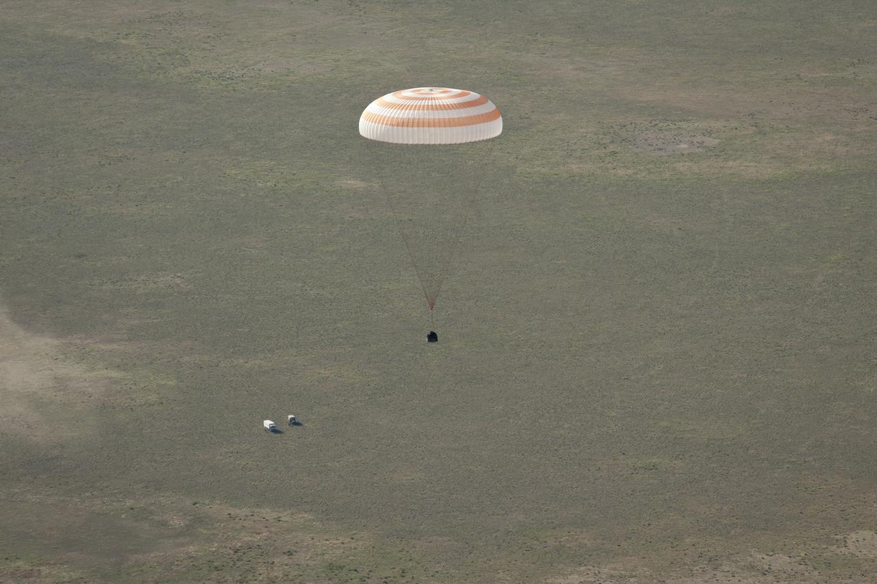 The Soyuz TMA-20 spacecraft is seen as it lands with Expedition 27 Commander Dmitry Kondratyev and Flight Engineers Paolo Nespoli and Cady Coleman in a remote area southeast of the town of Zhezkazgan, Kazakhstan, on Tuesday, May 24, 2011. NASA Astronaut Coleman, Russian Cosmonaut Kondratyev and Italian Astronaut Nespoli are returning from more than five months onboard the International Space Station where they served as members of the Expedition 26 and 27 crews. Photo Credit: (NASA/Bill Ingalls)