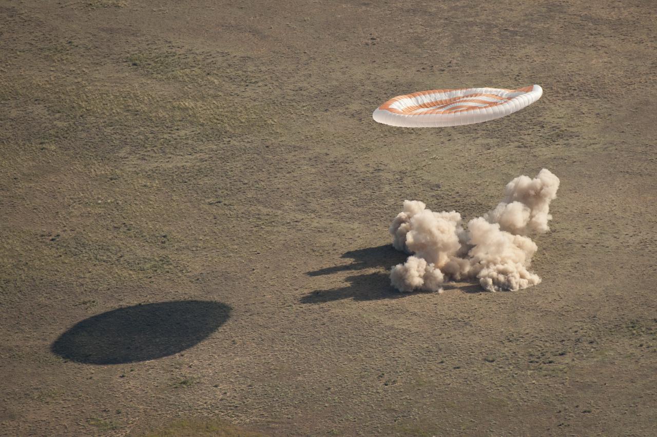 The Soyuz TMA-20 spacecraft is seen as it lands with Expedition 27 Commander Dmitry Kondratyev and Flight Engineers Paolo Nespoli and Cady Coleman in a remote area southeast of the town of Zhezkazgan, Kazakhstan, on Tuesday, May 24, 2011. NASA Astronaut Coleman, Russian Cosmonaut Kondratyev and Italian Astronaut Nespoli are returning from more than five months onboard the International Space Station where they served as members of the Expedition 26 and 27 crews. Photo Credit: (NASA/Bill Ingalls)