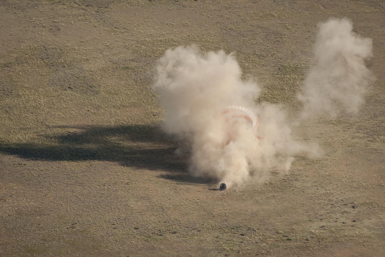 The Soyuz TMA-20 spacecraft is seen as it lands with Expedition 27 Commander Dmitry Kondratyev and Flight Engineers Paolo Nespoli and Cady Coleman in a remote area southeast of the town of Zhezkazgan, Kazakhstan, on Tuesday, May 24, 2011. NASA Astronaut Coleman, Russian Cosmonaut Kondratyev and Italian Astronaut Nespoli are returning from more than five months onboard the International Space Station where they served as members of the Expedition 26 and 27 crews. Photo Credit: (NASA/Bill Ingalls)