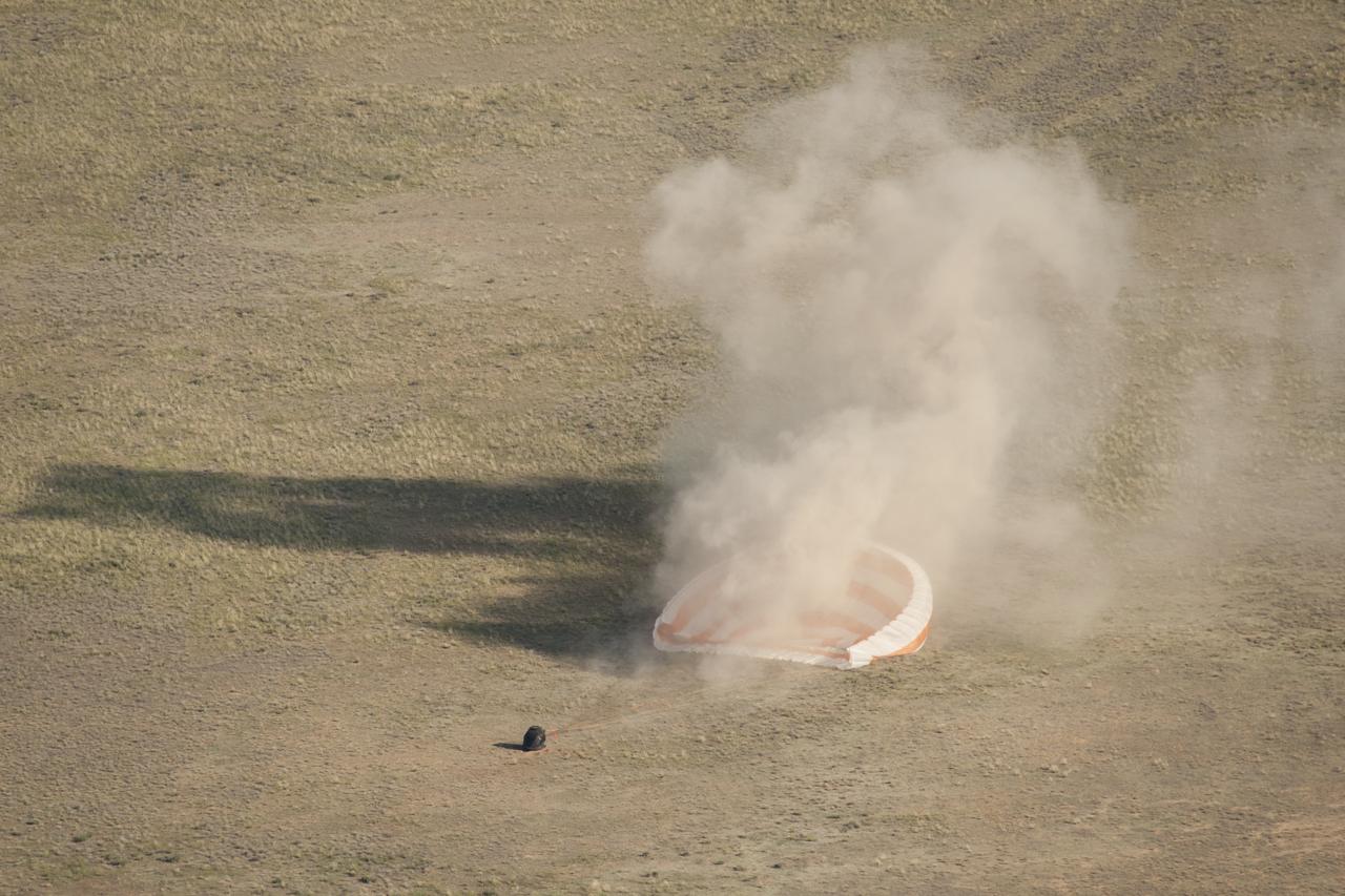 The Soyuz TMA-20 spacecraft is seen as it lands with Expedition 27 Commander Dmitry Kondratyev and Flight Engineers Paolo Nespoli and Cady Coleman in a remote area southeast of the town of Zhezkazgan, Kazakhstan, on Tuesday, May 24, 2011. NASA Astronaut Coleman, Russian Cosmonaut Kondratyev and Italian Astronaut Nespoli are returning from more than five months onboard the International Space Station where they served as members of the Expedition 26 and 27 crews. Photo Credit: (NASA/Bill Ingalls)