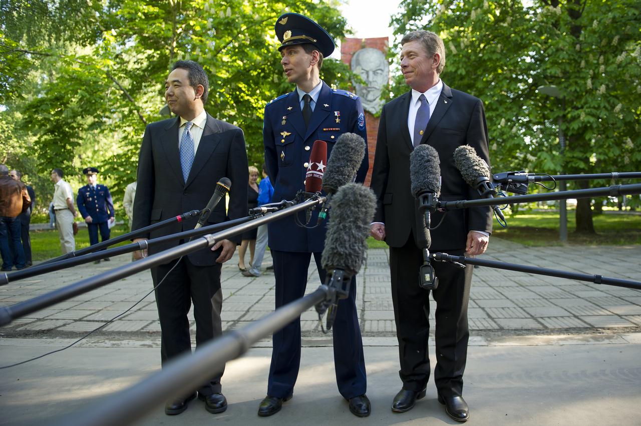 Expedition 28 crew members, Flight Engineer Satoshi Furukawa, left, Soyuz commander Sergei Volkov, center, and Flight Engineer Mike Fossum, answer reporters questions during a crew departure press conference held on the grounds of the Gagarin Cosmonaut Training Center, Wednesday, May 25, 2011 in Star City, Russia.  The crew later departed for Baikonur, Kazakhstan in preparation for their June launch onboard a Soyuz rocket.  Photo Credit: (NASA/Bill Ingalls)