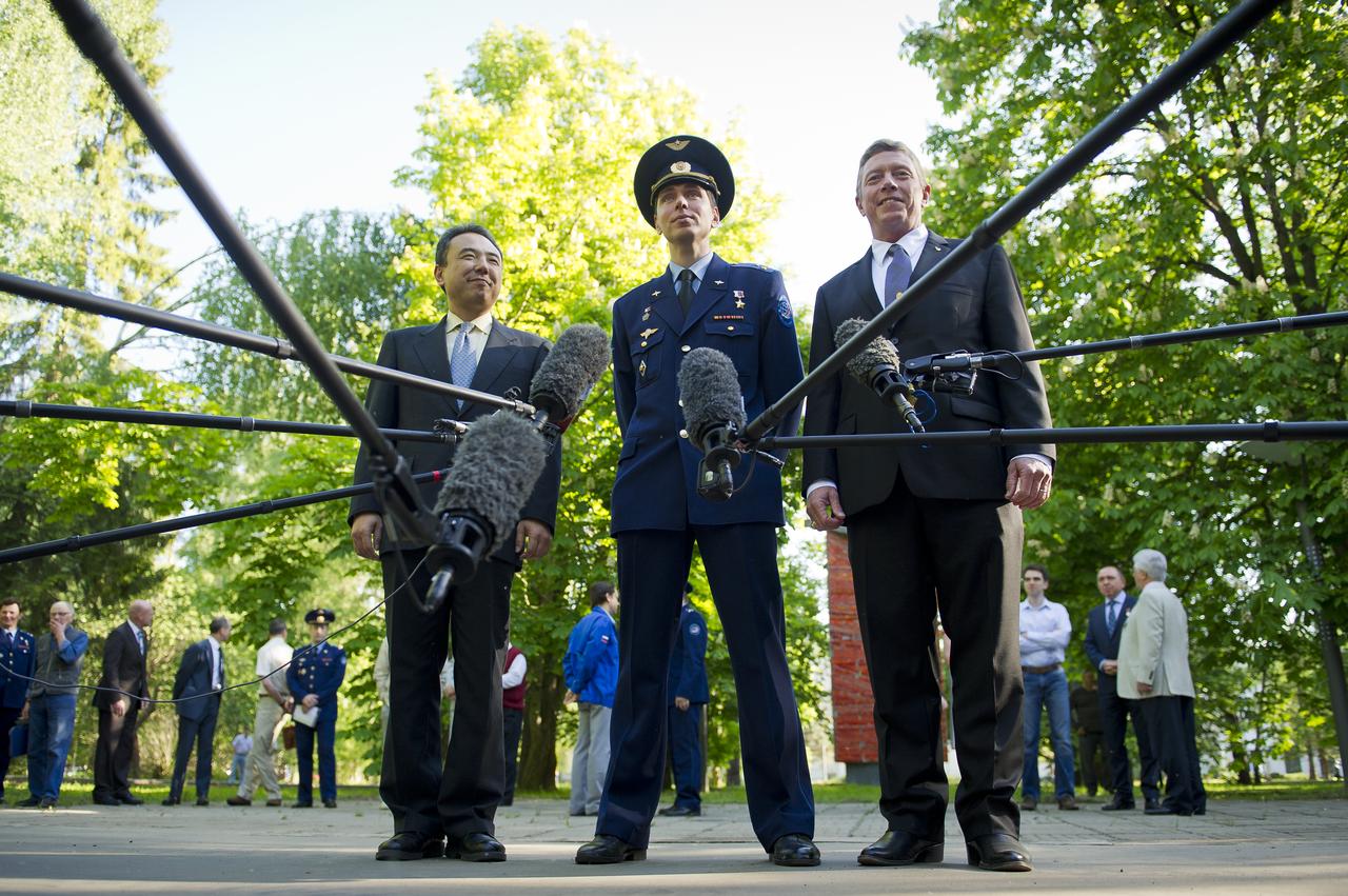 Expedition 28 crew members, Flight Engineer Satoshi Furukawa, left, Soyuz commander Sergei Volkov, center, and Flight Engineer Mike Fossum, answer reporters questions during a crew departure press conference held on the grounds of the Gagarin Cosmonaut Training Center, Wednesday, May 25, 2011 in Star City, Russia.  The crew later departed for Baikonur, Kazakhstan in preparation for their June launch onboard a Soyuz rocket.  Photo Credit: (NASA/Bill Ingalls)