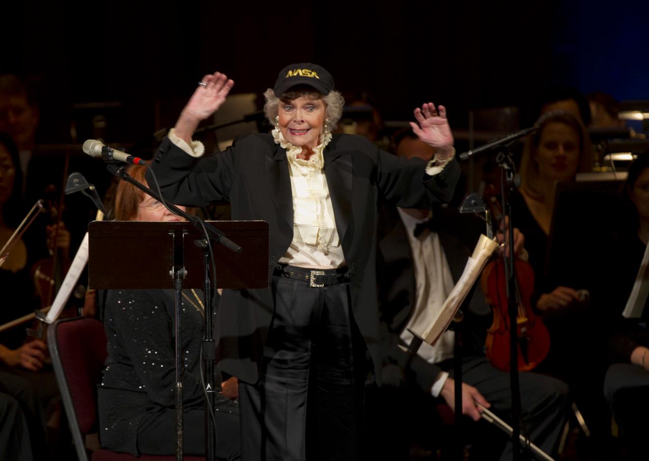 Actress June Lockhart livens up the audience after donning a NASA cap during a program entitled Human Spaceflight: The Kennedy Legacy, Wednesday, May 25, 2011, in the concert hall at the John F. Kennedy Center for the Performing Arts in Washington. The event marked the 50th Anniversary of President John F. Kennedy's Special Message to the Congress on Urgent National Needs in which he stated "landing a man on the moon and returning him safely to earth". Photo Credit: (NASA/Paul E. Alers)