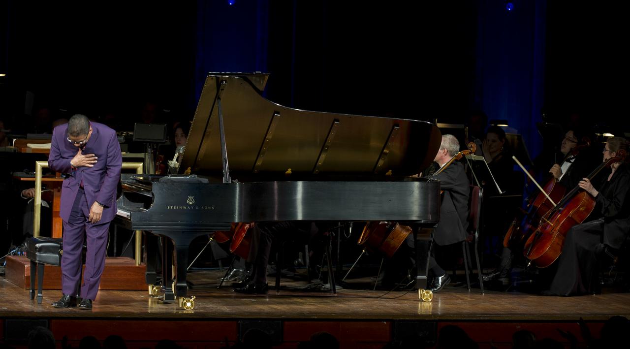 Musician Herbie Hancock bows to the audience after perfrorming during a program commemorating Human Spaceflight and the Kennedy Legacy, Wednesday, May 25, 2011, in the concert hall at the John F. Kennedy Center for the Performing Arts in Washington. The event marked the 50th Anniversary of President John F. Kennedy's Special Message to the Congress on Urgent National Needs in which he stated "landing a man on the moon and returning him safely to earth". Photo Credit: (NASA/Paul E. Alers)