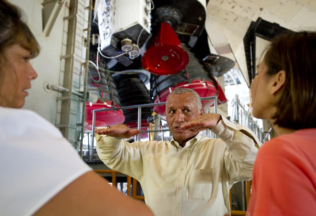 NASA Administrator Charles Bolden talks with other NASA management atop of the Mobile Launcher Platform (MLP) just prior to rollout of the Space Shuttle Atlantis (STS-135) from High Bay 3 in the Vehicle Assembly Building to Launch Pad 39a for its final flight, Tuesday evening, May 31, 2011, at Kennedy Space Center in Cape Canaveral, Fla. The 3.4-mile trek, known as "rollout," will take about seven hours to complete. Atlantis will carry the Raffaello multipurpose logistics module to deliver supplies, logistics and spare parts to the International Space Station. The launch of STS-135 is targeted for July 8. Photo Credit: (NASA/Bill Ingalls)