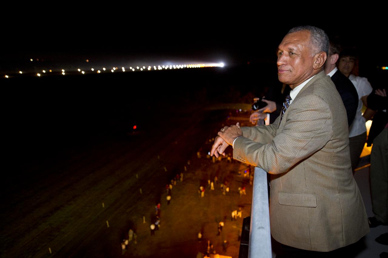 NASA Administrator Charles Bolden looks at the Space Shuttle Endeavour (STS-134) from the air traffic control tower at the Shuttle Landing Facility (SLF) shortly after Endeavour made its final landing at the Kennedy Space Center, Wednesday, June 1, 2011, in Cape Canaveral, Fla. Endeavour, after completing a 16-day mission to outfit the International Space Station, spent 299 days in space and traveled more than 122.8 million miles during its 25 flights. It launched on its first mission on May 7, 1992. Photo Credit: (NASA/Bill Ingalls)