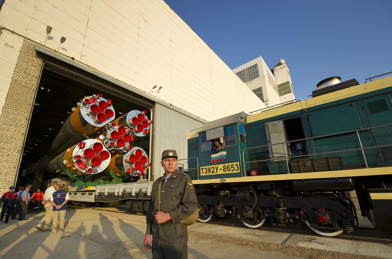The Soyuz TMA-02M spacecraft is rolled out by train on its way to the launch pad at the Baikonur Cosmodrome, Kazakhstan, Sunday, June 5, 2011.  The launch of the Soyuz spacecraft with Expedition 28 Soyuz Commander Sergei Volkov of Russia, NASA Flight Engineer Mike Fossum and JAXA (Japan Aerospace Exploration Agency) Flight Engineer Satoshi Furukawa is scheduled for 2:15 a.m. local time on Wednesday, June 8, 2011.  Photo Credit (NASA/Carla Cioffi)