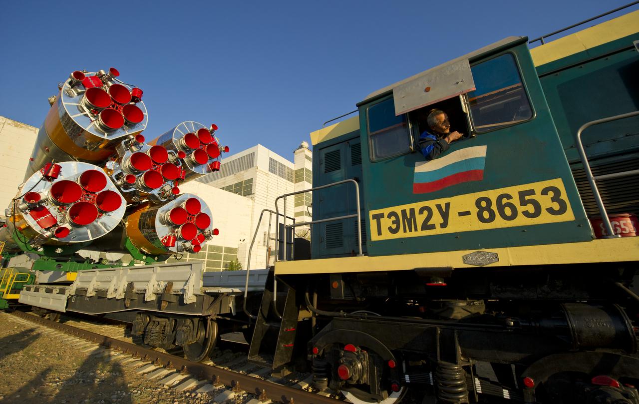 The Soyuz TMA-02M spacecraft is rolled out by train on its way to the launch pad at the Baikonur Cosmodrome, Kazakhstan, Sunday, June 5, 2011.  The launch of the Soyuz spacecraft with Expedition 28 Soyuz Commander Sergei Volkov of Russia, NASA Flight Engineer Mike Fossum and JAXA (Japan Aerospace Exploration Agency) Flight Engineer Satoshi Furukawa is scheduled for 2:15 a.m. local time on Wednesday, June 8, 2011.  Photo Credit (NASA/Carla Cioffi)