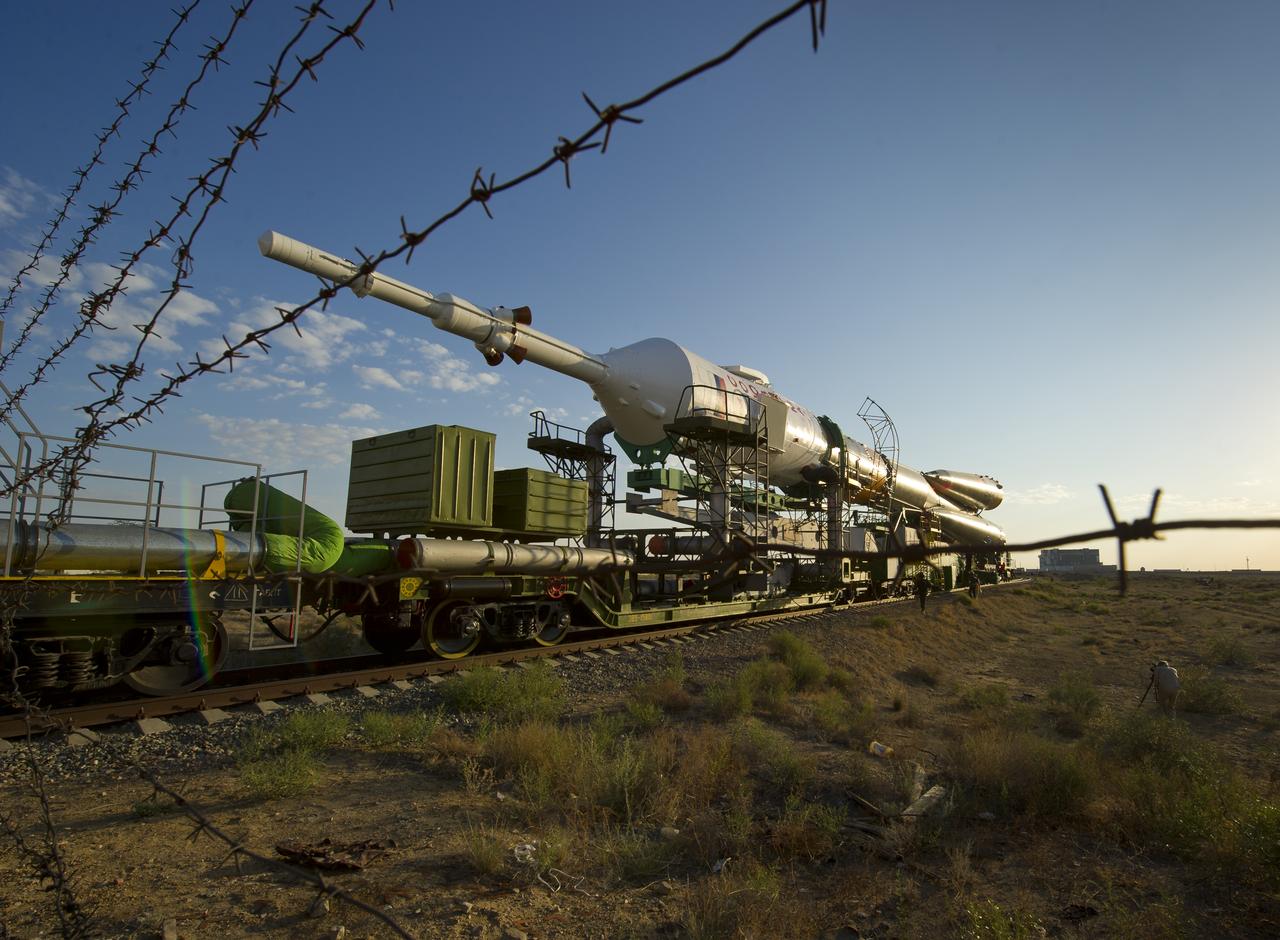 The Soyuz TMA-02M spacecraft is rolled out by train on its way to the launch pad at the Baikonur Cosmodrome, Kazakhstan, Sunday, June 5, 2011.  The launch of the Soyuz spacecraft with Expedition 28 Soyuz Commander Sergei Volkov of Russia, NASA Flight Engineer Mike Fossum and JAXA (Japan Aerospace Exploration Agency) Flight Engineer Satoshi Furukawa is scheduled for 2:15 a.m. local time on Wednesday, June 8, 2011.  Photo Credit (NASA/Carla Cioffi)