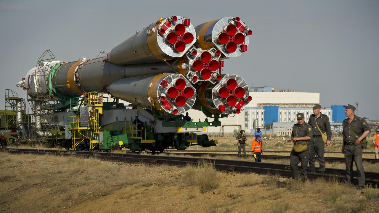 The Soyuz TMA-02M spacecraft is carried by train on its way to the launch pad at the Baikonur Cosmodrome, Kazakhstan, Sunday, June 5, 2011.  The launch of the Soyuz spacecraft with Expedition 28 Soyuz Commander Sergei Volkov of Russia, NASA Flight Engineer Mike Fossum and JAXA (Japan Aerospace Exploration Agency) Flight Engineer Satoshi Furukawa is scheduled for 2:15 a.m. local time on Wednesday, June 8, 2011.  Photo Credit (NASA/Carla Cioffi)