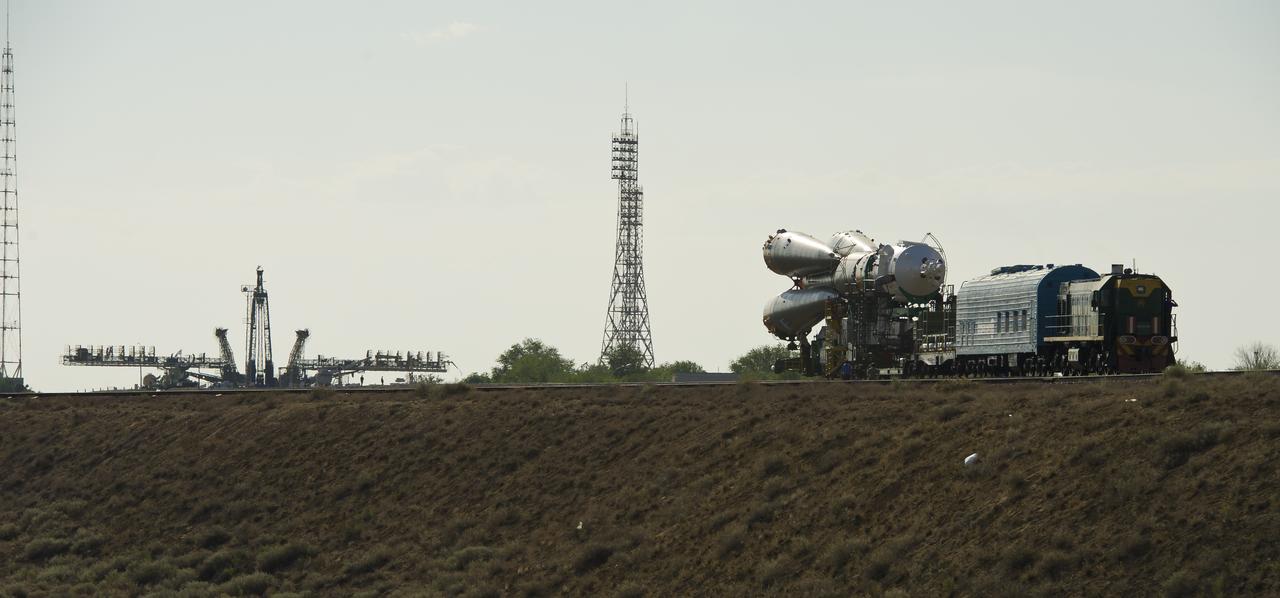 The Soyuz rocket is seen as it approaches the Soyuz launch pad in the distance on Sunday, June 5, 2011 at the Baikonur Cosmodrome in Kazakhstan.  The TMA-02M spacecraft will carry Expedition 28 Soyuz Commander Sergei Volkov of Russia, NASA Flight Engineer Mike Fossum and JAXA (Japan Aerospace Exploration Agency) Flight Engineer Satoshi Furukawa to the Internationa Space Station. Photo Credit (NASA/Carla Cioffi)