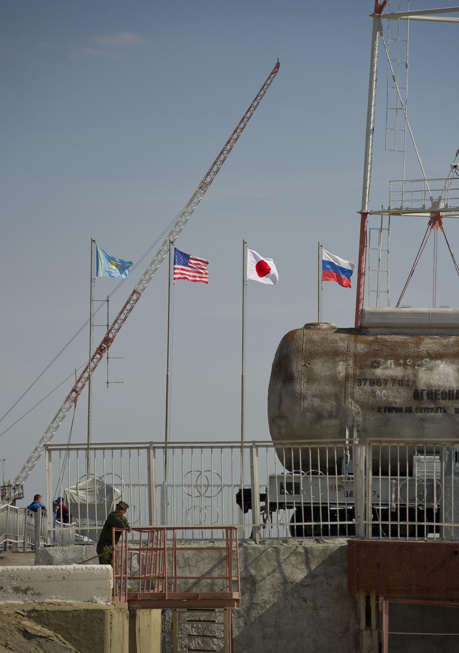 The flags representing Kazakhstan and the nations of the three crew members who will launch in the Soyuz TMA-02M spacecraft are shown at the launch pad at the Baikonur Cosmodrome in Kazakhstan on Sunday, June 5, 2011.   From left to right are the flags of Kazakhstan, the United States, Japan and Russia.  Scheduled to launch on June 8 local time are Expedition 28 NASA Flight Engineer Mike Fossum, JAXA (Japan Aerospace Exploration Agency) Flight Engineer Satoshi Furukawa and Soyuz Commander Sergei Volkov of Russia. Photo Credit (NASA/Carla Cioffi)