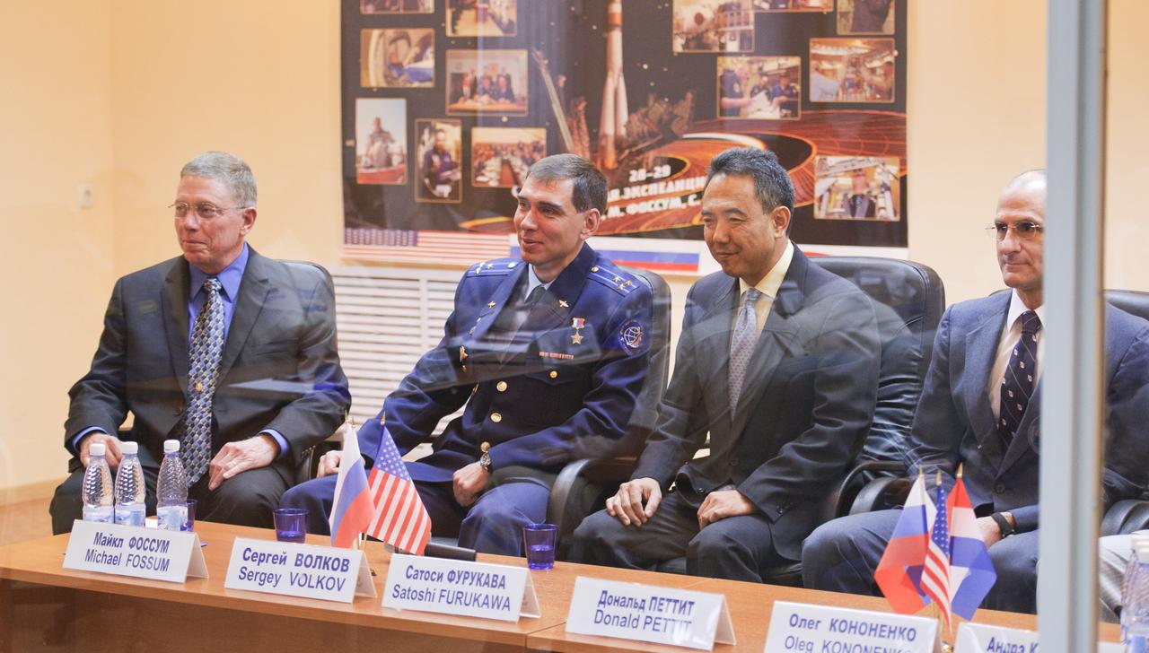 Expedition 28 NASA Flight Engineer Mike Fossum, left, Soyuz Commander Sergei Volkov, Japan Aerospace Exploration Agency (JAXA) Flight Engineer Satoshi Furukawa, and NASA backup Flight Engineer Don Pettit are seen seated during the State Commission meeting to approve the Soyuz launch of Expedition 28 to the International Space Station, Monday, June 6, 2011, at the Cosmonaut Hotel in Baikonur, Kazakhstan. The mission is set to launch on Tuesday, June 8, from the Baikonur Cosmodrome. Photo Credit: (NASA/Carla Cioffi)