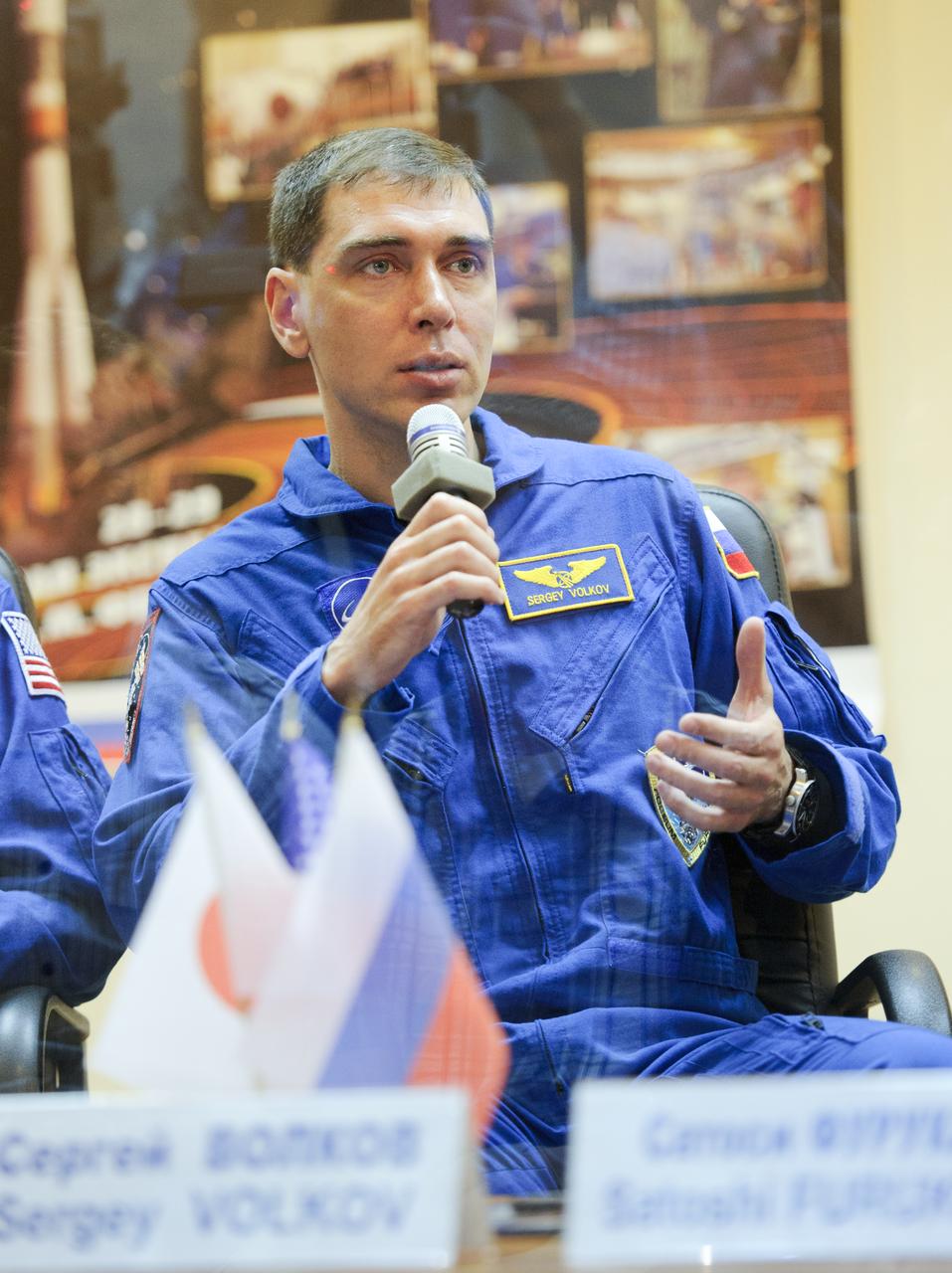 Expedition 28 Soyuz Commander Sergei Volkov of Russia speaks during a press conference, Monday, June 6, 2011, at the Cosmonaut Hotel in Baikonur, Kazakhstan. The mission is set to launch on Tuesday, June 7, from the Baikonur Cosmodrome. Photo Credit: (NASA/Carla Cioffi)