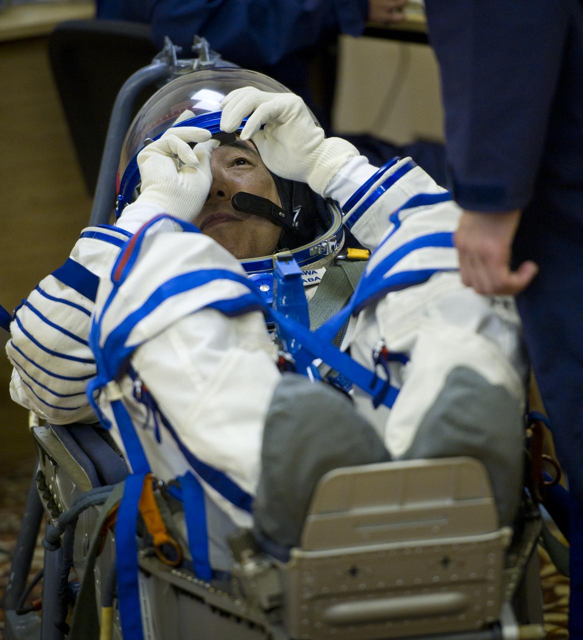 JAXA (Japanese Aerospace Exploration Agency) astronaut and Expedition 28 Flight Engineer Satoshi Furukawa has his Russian Sokol suit pressure checked in preparation for his launch to the International Space Station, Tuesday, June 7, 2011 at the Baikonur Cosmodrome in Kazakhstan.  The Soyuz spacecraft will launch the following morning on June 8 carrying Expedition 28 Soyuz Commander Sergei Volkov, NASA Flight Engineer Mike Fossum and Furukawa.  Photo Credit:  (NASA/Carla Cioffi)