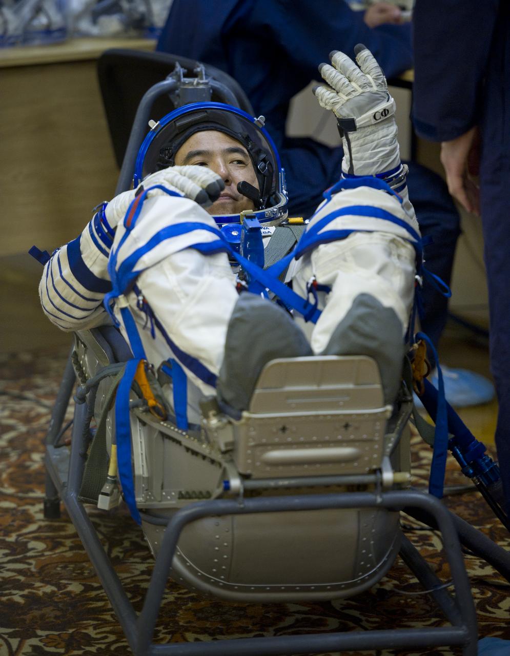 JAXA (Japanese Aerospace Exploration Agency) astronaut and Expedition 28 Flight Engineer Satoshi Furukawa has his Russian Sokol suit pressure checked in preparation for his launch to the International Space Station, Tuesday, June 7, 2011 at the Baikonur Cosmodrome in Kazakhstan.  The Soyuz spacecraft will launch the following morning on June 8 carrying Expedition 28 Soyuz Commander Sergei Volkov, NASA Flight Engineer Mike Fossum and Furukawa.  Photo Credit:  (NASA/Carla Cioffi)