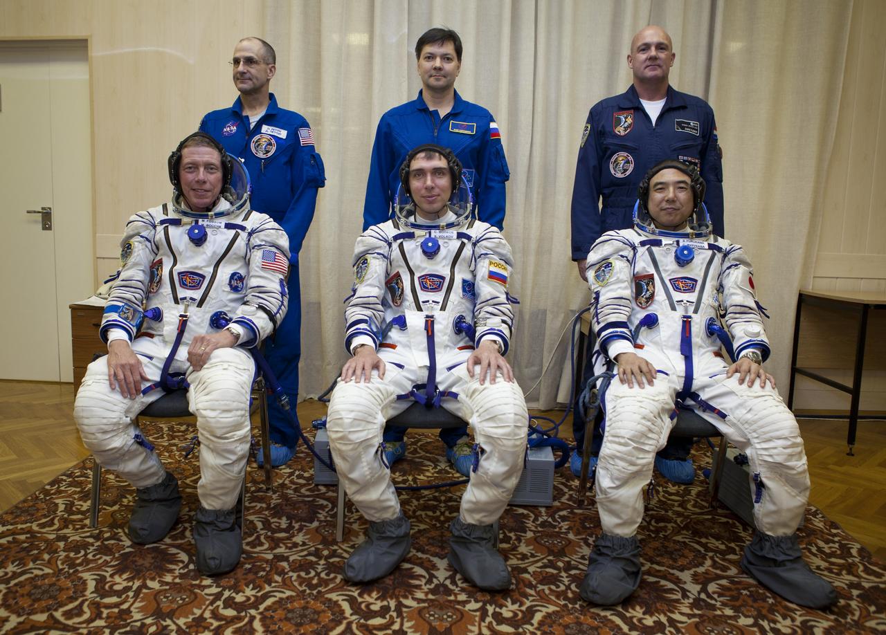Expedition 28 NASA Flight Engineer Mike Fossum, front left, Expedition 28 Soyuz Commander Sergei Volkov, front center, and Expedition 28 JAXA (Japan Aerospace Exploration Agency)Flight Engineer Satoshi Furukawa pose with backup crewmembers NASA Flight Engineer Don Pettit of the U.S., back left, Flight Engineer Oleg Kononenko of Russia, back center, and ESA (European Space Agency) Flight Engineer Andre Kuipers of The Netherlands, prior to the crews’ launch onboard a Soyuz rocket to the International Space Station on Tuesday, June 7, 2011, in Baikonur, Kazakhstan.  Photo Credit: (NASA/Roscosmos/Andrey Shelepin)
