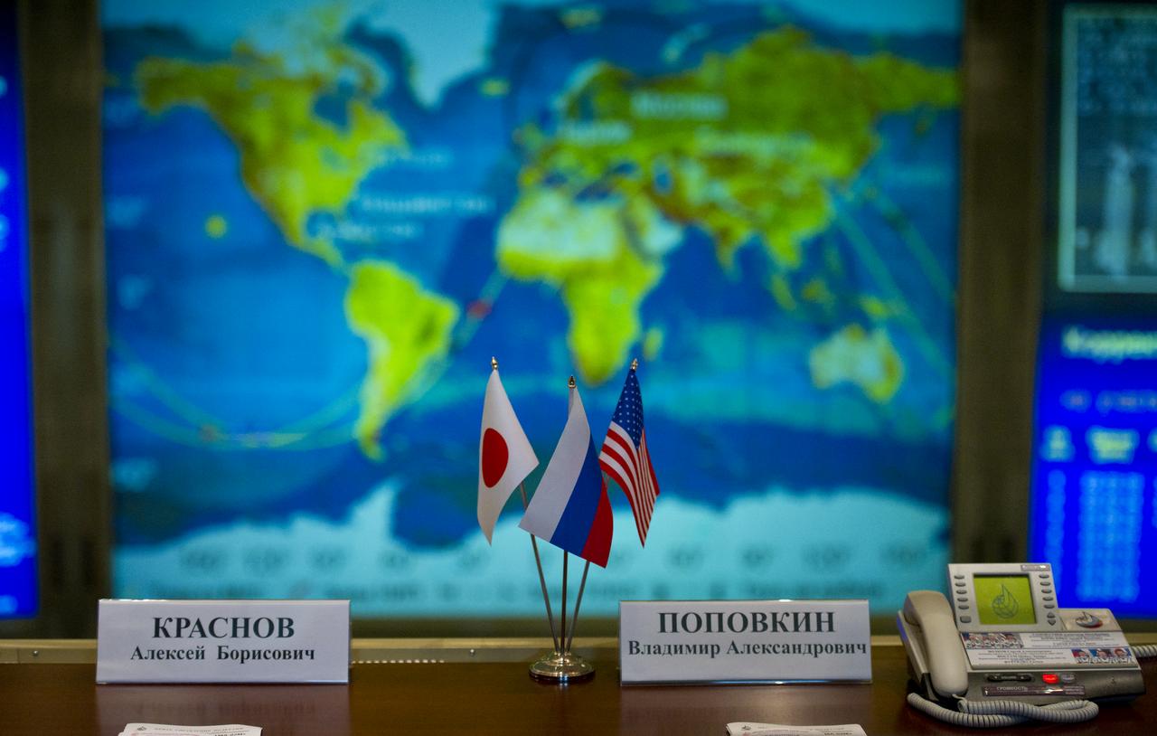 The flags of the countries representing the crew members of Expedition 28 are seen here at the Russian Mission Control Center in Korolev, Russia on Friday, June 10, 2011.  The Soyuz TMA-02M docked to the International Space Station carrying Expedition 28 Soyuz Commander Sergei Volkov, NASA Flight Engineer Mike Fossum and JAXA (Japanase Aerospace Exploration Agency) Flight Engineer Satoshi Furukawa.  Photo Credit: (NASA/Carla Cioffi)