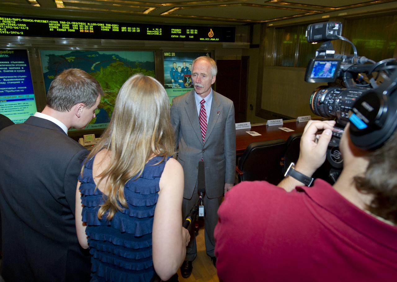 William Gerstenmaier, Associate Administrator for Space Operations, is interviewed by Russian Federal Space Agency (ROSCOSMOS) TV following a Soyuz post-docking press conference at the Russian Mission Control Center in Korolev, Russia on Friday, June 10, 2011.  The Soyuz TMA-02M docked to the International Space Station carrying Expedition 28 Soyuz Commander Sergei Volkov, NASA Flight Engineer Mike Fossum and JAXA (Japanase Aerospace Exploration Agency) Flight Engineer Satoshi Furukawa.  Photo Credit: (NASA/Carla Cioffi)