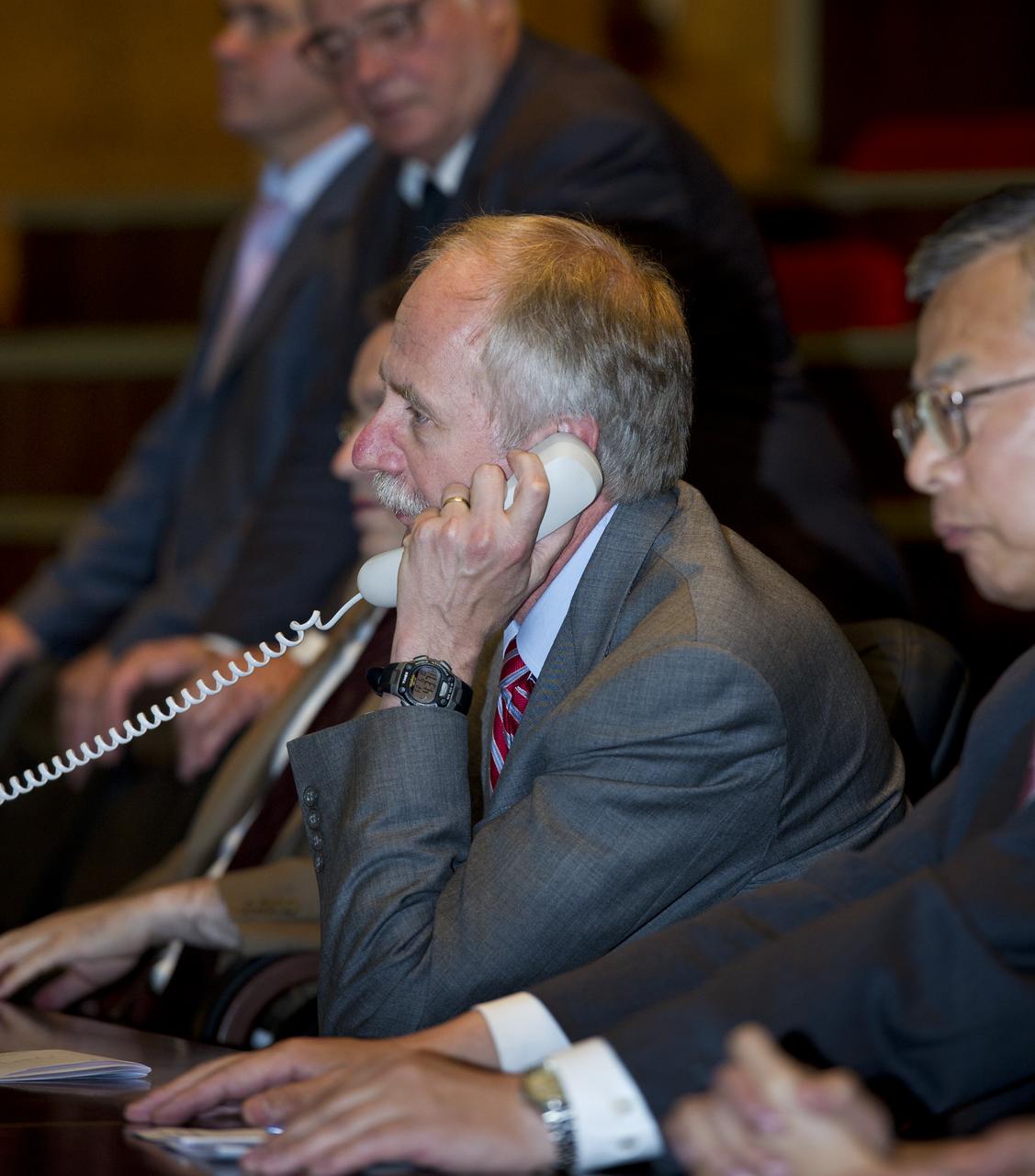 William Gerstenmaier, Associate Administrator for Space Operations, is seen at Russian Mission Control in Korolev, Russia speaking to the crew of Expedition 28 shortly after their arrival at the International Space Station on Friday, June 10, 2011.  Photo Credit: (NASA/Carla Cioffi)