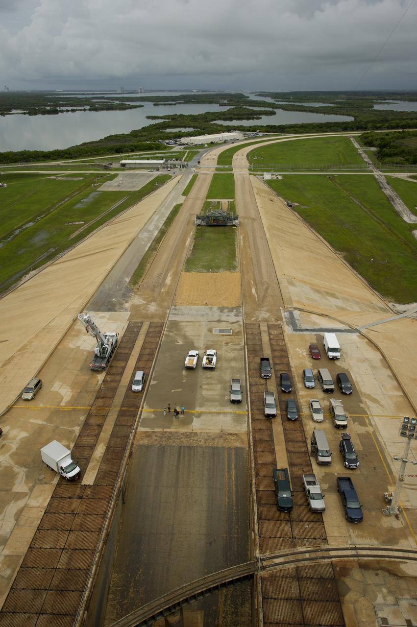 The flame trench underneath the space shuttle Atlantis at pad 39a is seen on Thursday, July 7, 2011 at the NASA Kennedy Space Center in Cape Canaveral, Fla.  Space shuttle Atlantis is set to liftoff Friday, July 8, on the final flight of the shuttle program, STS-135, a 12-day mission to the International Space Station.  Photo Credit: (NASA/Bill Ingalls)