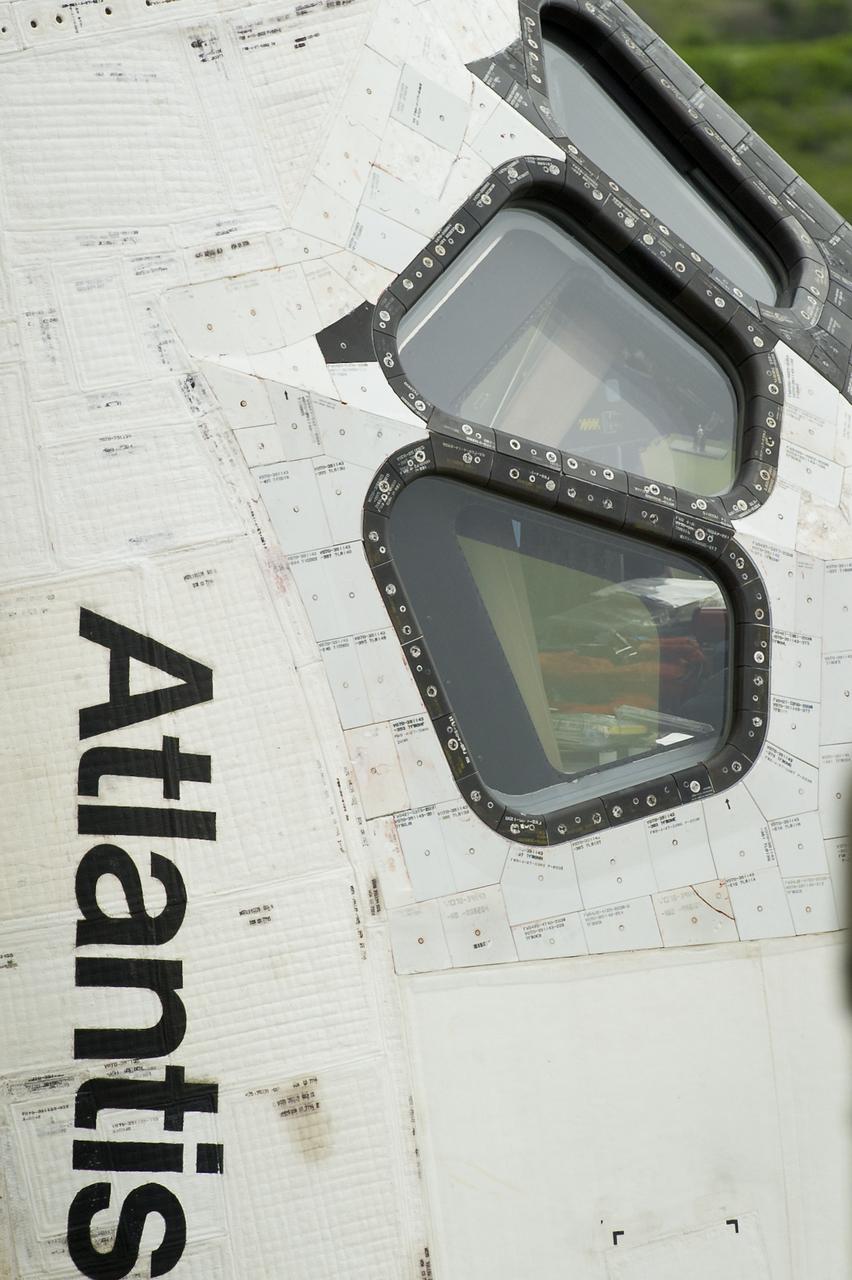 The space shuttle Atlantis is revealed as the rotating service structure (RSS) is rolled back at launch pad 39a on Thursday, July 7, 2011 at the NASA Kennedy Space Center in Cape Canaveral, Fla.  Atlantis is set to liftoff Friday, July 8, on the final flight of the shuttle program, STS-135, a 12-day mission to the International Space Station.  Photo Credit: (NASA/Bill Ingalls)